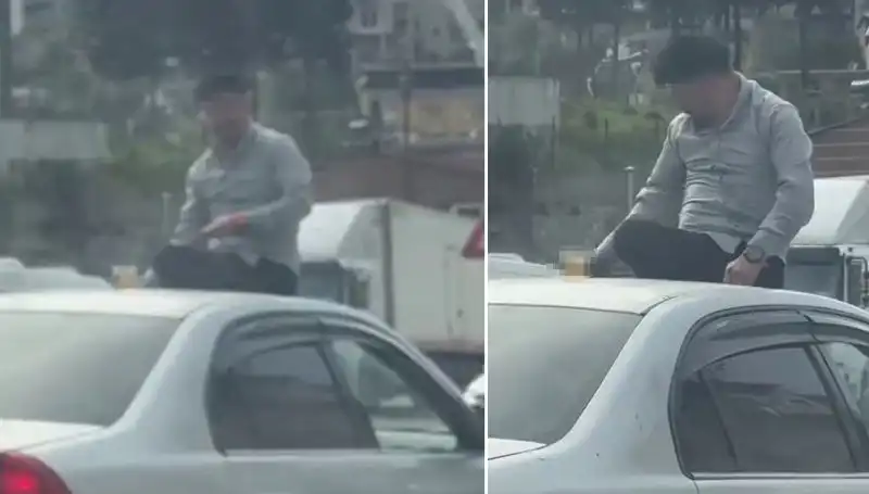 Trafikte Pes Dedirten Görüntü: Otomobil Üzerinde Alem Yapan Sürücü!